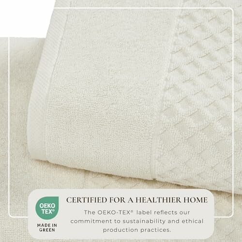Eco-friendly bath towel with OEKO-TEX Made in Green label.