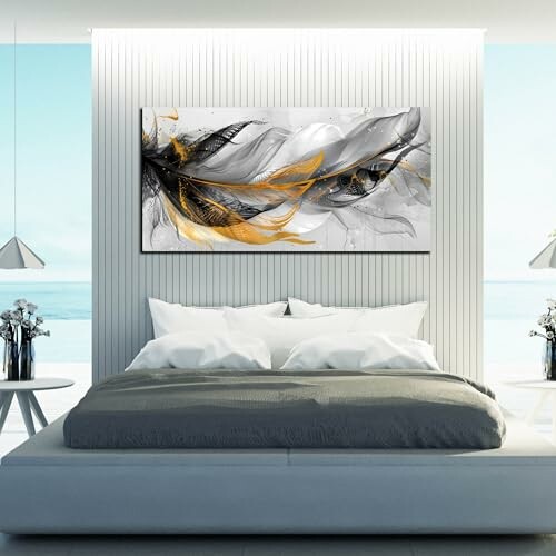 Modern bedroom with abstract wall art above the bed.