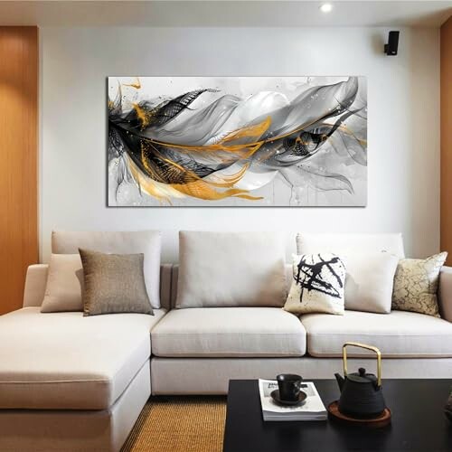 Contemporary living room with abstract wall art and neutral decor.