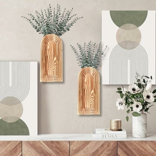 Modern wall art with wooden vases and abstract designs.