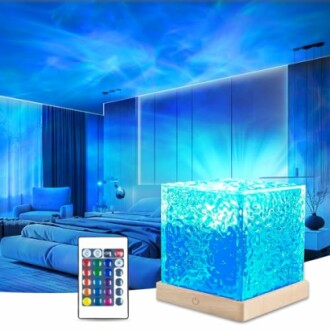Ocean wave projector creating a blue ambient light in a bedroom with a remote control.