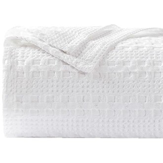 White woven blanket with textured pattern