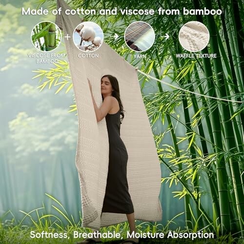 Woman hugging soft fabric in a bamboo forest with material composition icons.